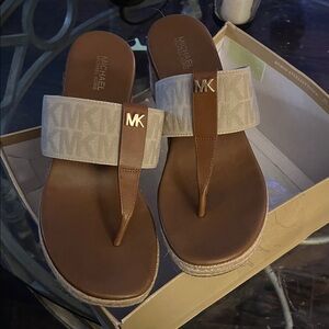 Brand New-Michael Kors Tan and Cream Logo Sandals.  Great for summer & vacations